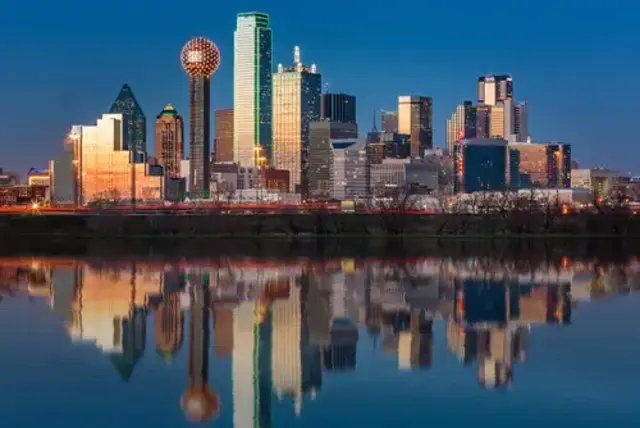 distance from Austin to Dallas, Dallas skyline reflected in Trinity River at sunset