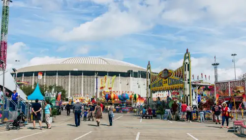 Experience the thrill of a carnival in a parking lot at NRG Park's electrifying events from February to April 2024. Don't miss out on the excitement!