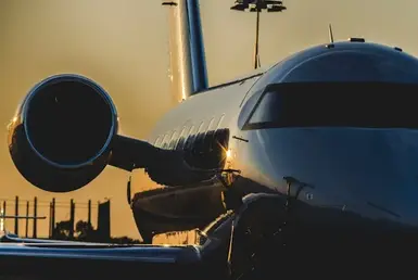 The image shows a private jet, a business jet, or bizjet. These are suitable for transporting small groups of people, typically business executives or high-ranking individuals, representing a Houston car service to airport.