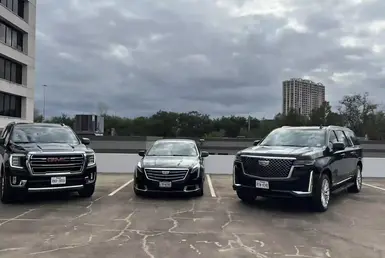 Lavish Ride's luxury fleet features a business-class sedan, a Cadillac XT6, a business-class SUV, a GMC Yukon SLT, and a first-class SUV, a Cadillac Escalade ESV—symbolizing Houston executive airport car service.