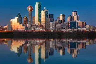 distance from Austin to Dallas, Dallas skyline reflected in Trinity River at sunset