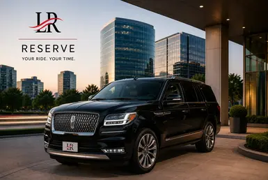 Luxury black Lincoln Navigator SUV with Lavish Ride LR plate parked outside modern office buildings in Houston’s Energy Corridor at sunset, representing premium executive car service and private transportation.