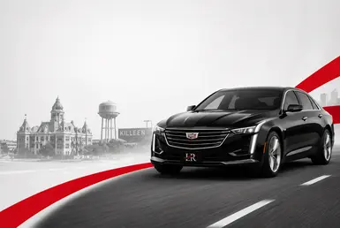 Black Cadillac sedan providing private Houston to Temple & Killeen car service with Lavish Ride branding.