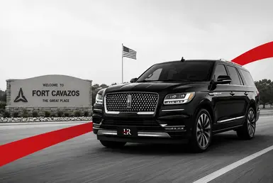 Black Lincoln Navigator providing military transportation service to Fort Cavazos with Lavish Ride branding.