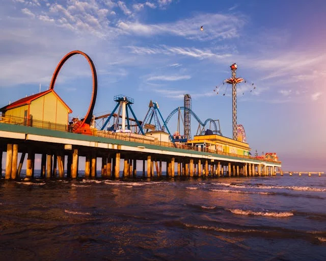 Beachfront amusement park with a roller coaster in Galveston, Texas, symbolizing the Galveston Cruise Port